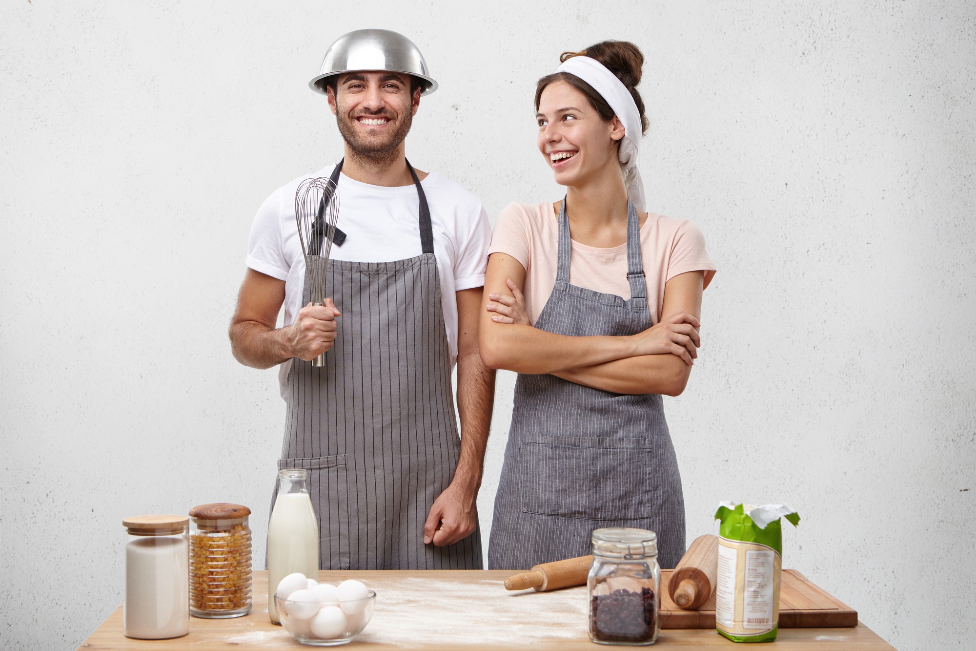 Chef smiling with team in kitchen