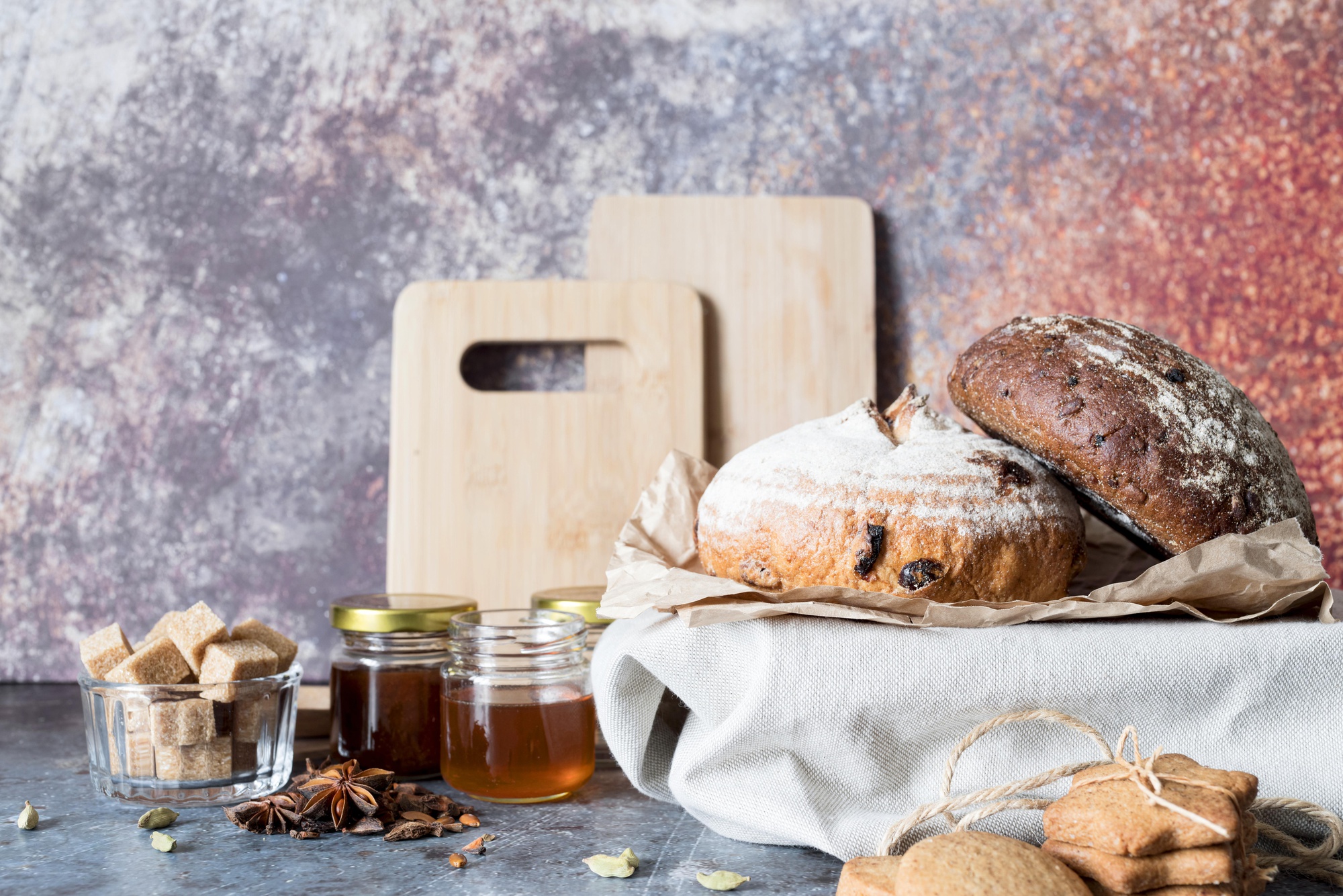 Rustic bread and preserves on table
